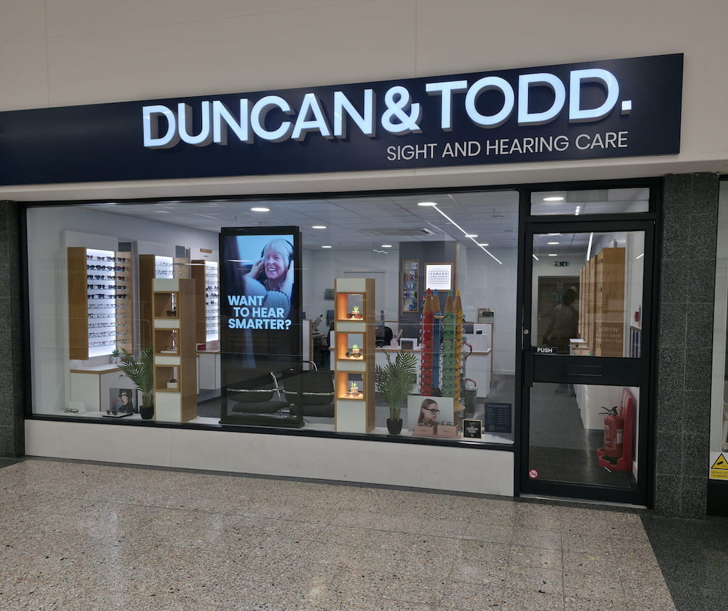 Refurbished retail unit shopfront and glazed entrance in a shopping centre